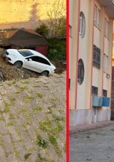 Kocaeli'de faciadan d&ouml;n&uuml;ld&uuml;: İstinat duvarı &ccedil;&ouml;kt&uuml;! Otomobil okul bah&ccedil;esine u&ccedil;tu